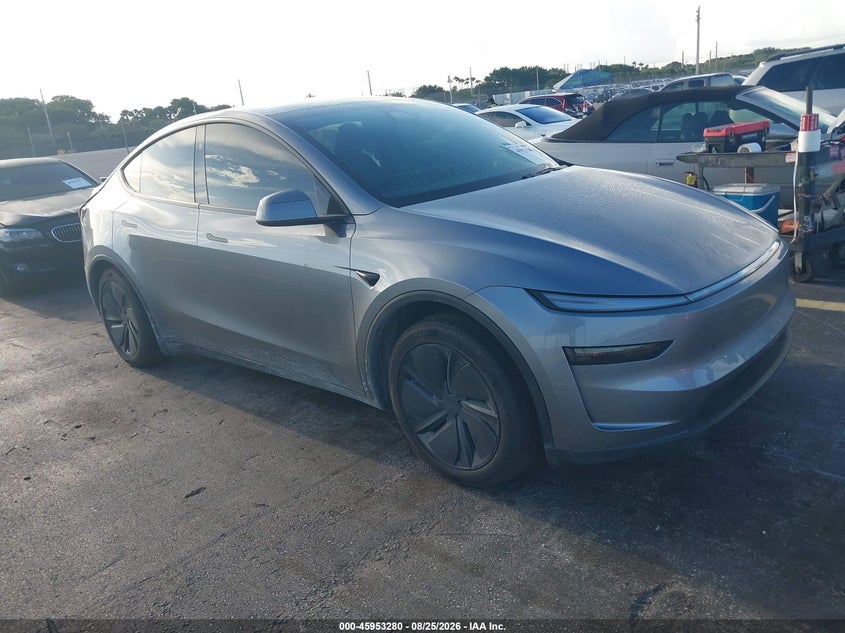 2026 Tesla Model Y VIN 7SAYGDED9TA477971 — IAAI salvage auction photo