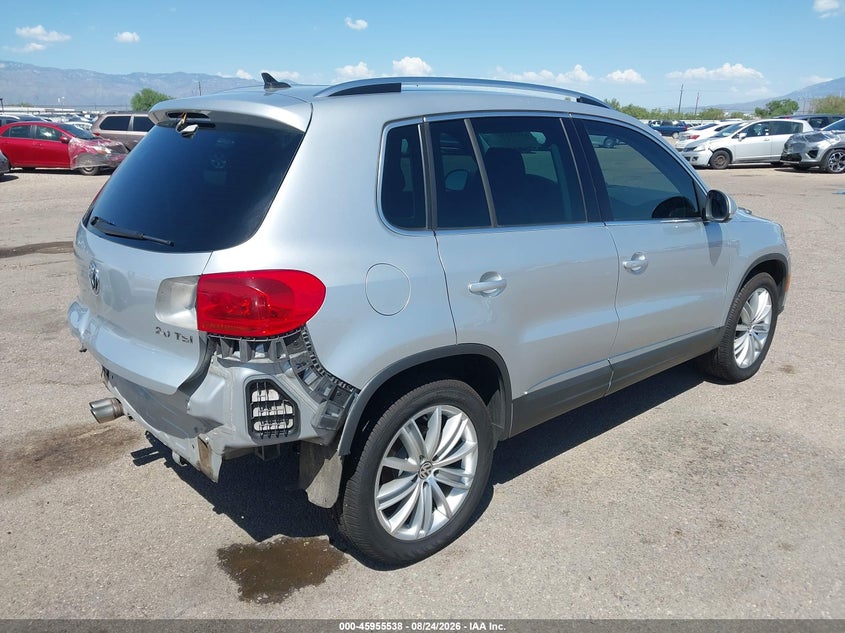 2014 Volkswagen Tiguan VIN WVGAV3AX6EW562892 IAAI salvage auction — REAR END, Salvage (Arizona), sold $2,050 on 2026-08-28 (photo 4)