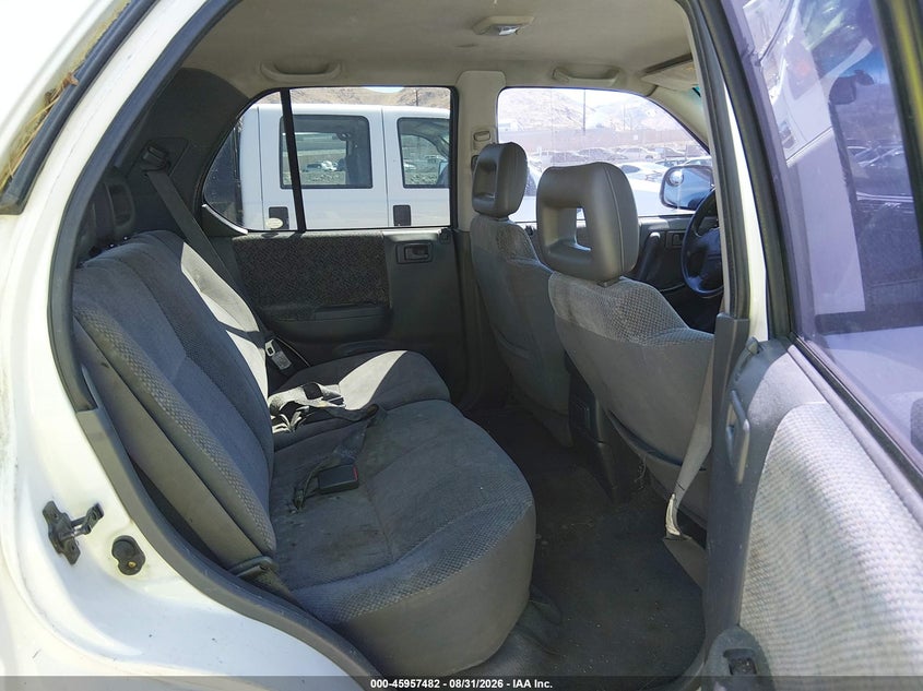 1999 Isuzu Rodeo VIN 4S2CM58WXX4361122 IAAI salvage auction — NORMAL WEAR, Regular (Nevada), sold $25 on 2026-09-18 (photo 8)
