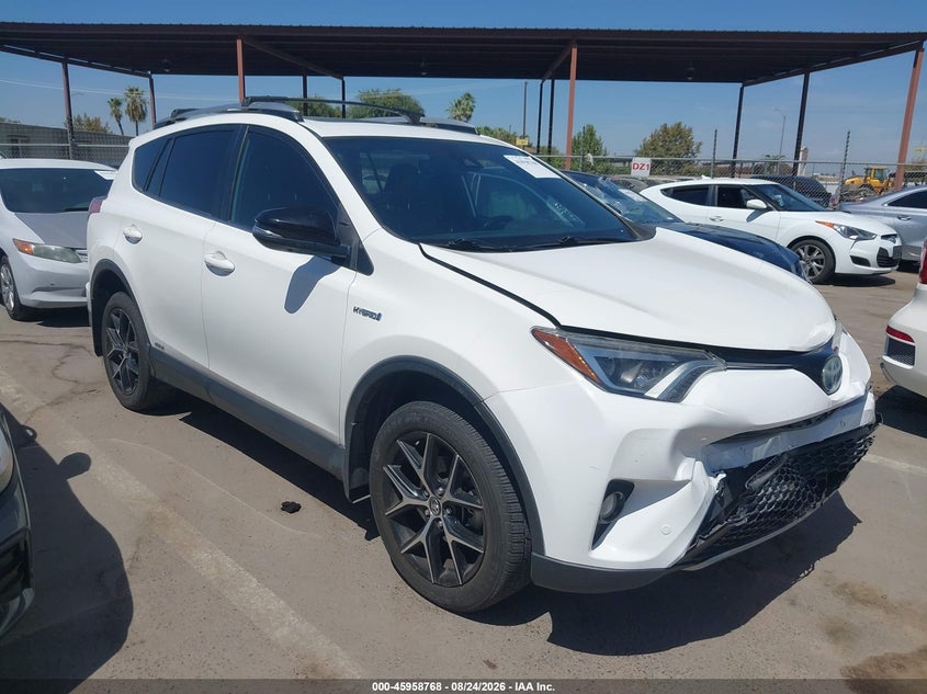 2018 Toyota Rav4 hybrid VIN JTMJJREV9JD247991 — IAAI salvage auction photo