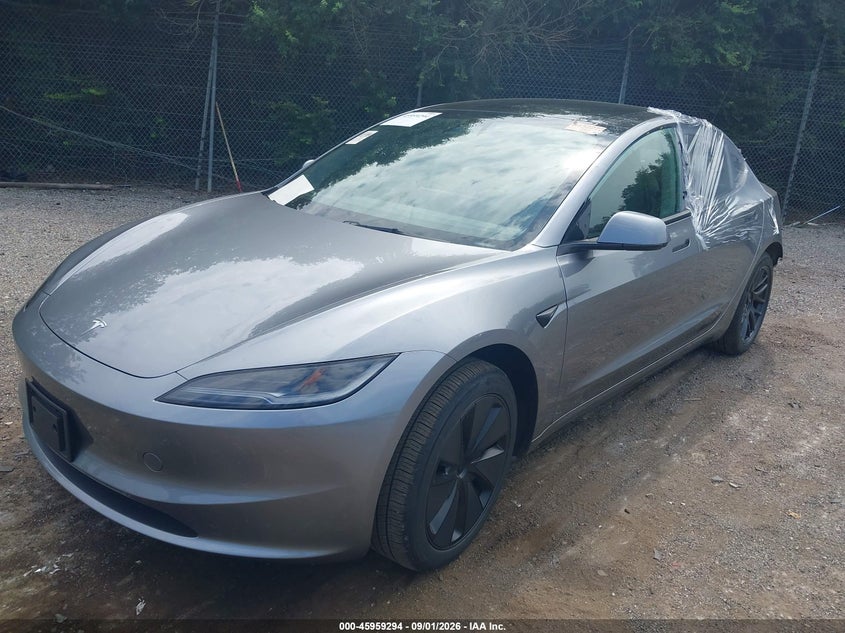 2025 Tesla Model 3 VIN 5YJ3E1EA2SF071131 IAAI salvage auction — LEFT SIDE, Salvage Title, sold $20,700 on 2026-09-25 (photo 2)
