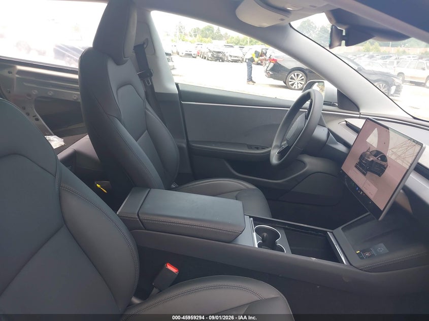2025 Tesla Model 3 VIN 5YJ3E1EA2SF071131 IAAI salvage auction — LEFT SIDE, Salvage Title, sold $20,700 on 2026-09-25 (photo 5)