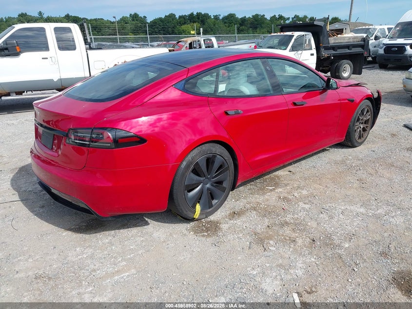 2023 Tesla Model s VIN 5YJSA1E57PF500670 IAAI salvage auction — RIGHT FRONT, Salvage Title, sold $31,200 on 2026-09-23 (photo 4)