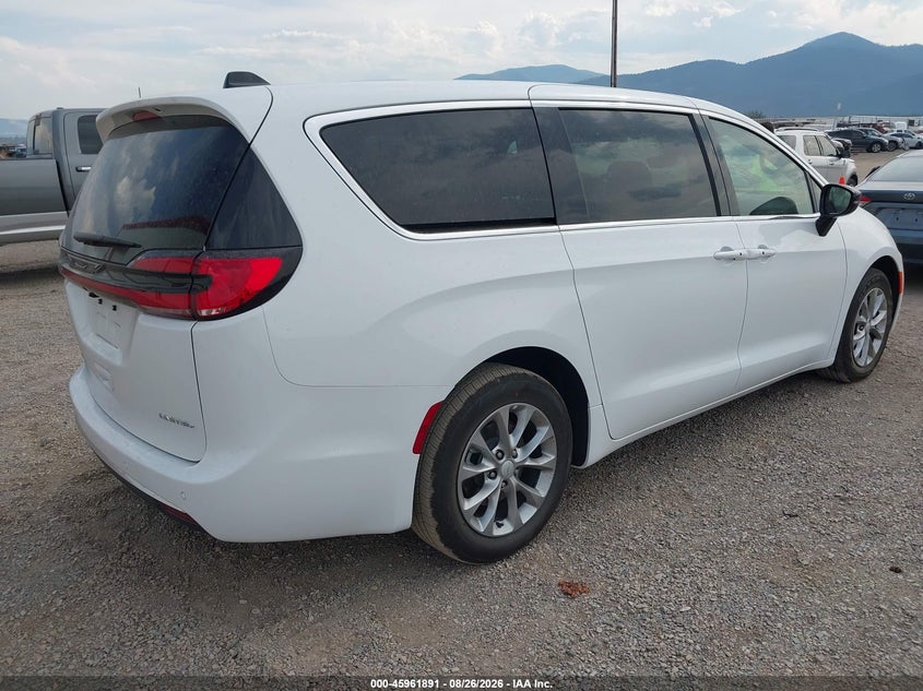 2027 Chrysler Pacifica VIN 2C4RC1GG9VR581423 IAAI salvage auction — SIDE, Enterprise Vehicles Clear Only (Montana), sold $20,500 on 2026-08-29 (photo 4)