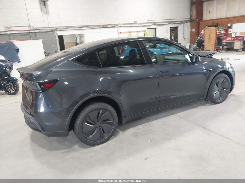2026 Tesla Model y VIN 7SAYGAEE1TF676118 IAAI salvage auction — FRONT & REAR, Salvage Title, sold $18,600 on 2026-10-07 (photo 4)