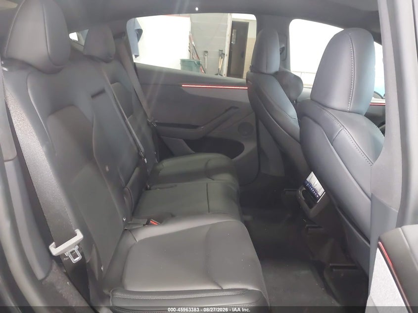 2026 Tesla Model y VIN 7SAYGAEE1TF676118 IAAI salvage auction — FRONT & REAR, Salvage Title, sold $18,600 on 2026-10-07 (photo 8)