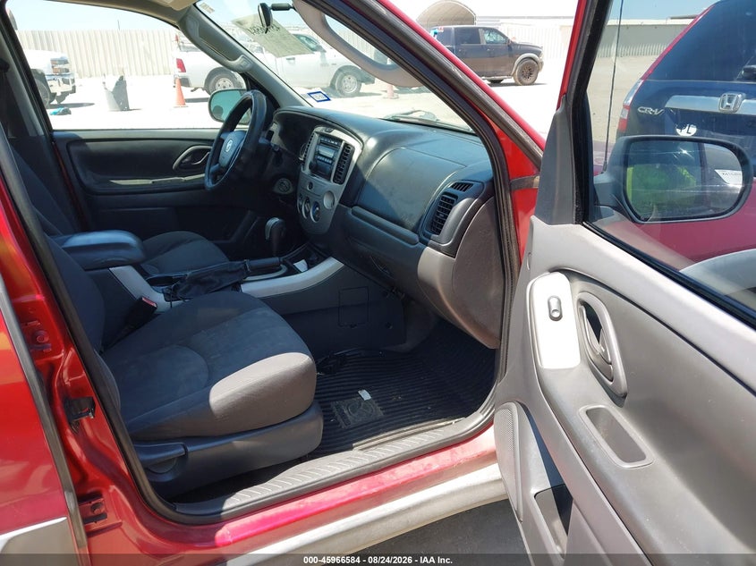 2006 Mazda Tribute VIN 4F2YZ02Z66KM18404 IAAI salvage auction — NORMAL WEAR, Original (Texas), sold $950 on 2026-09-02 (photo 5)