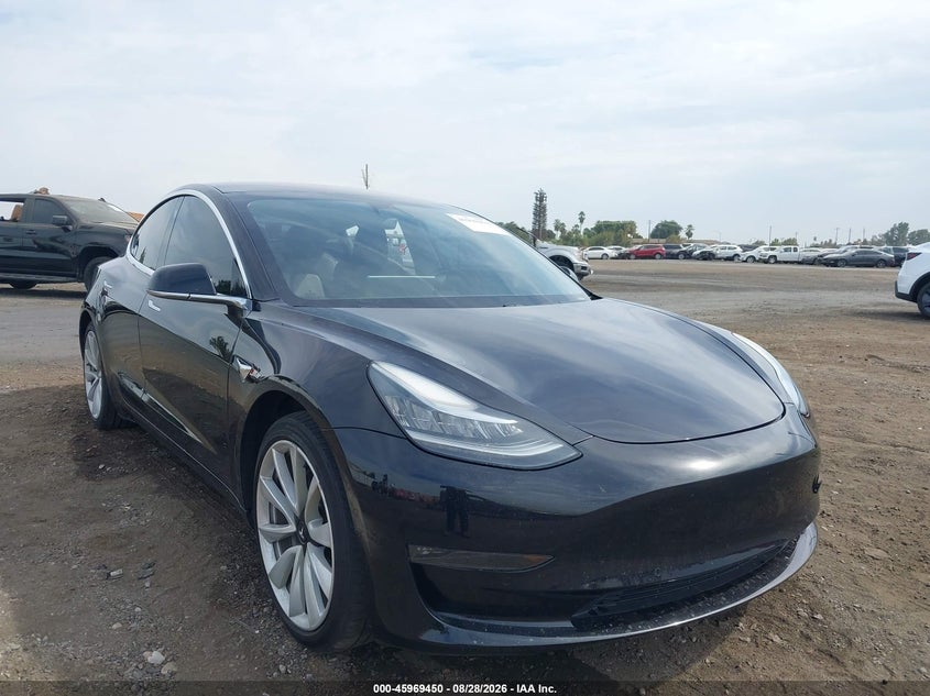 2018 Tesla Model 3 VIN 5YJ3E1EA1JF071068 — IAAI salvage auction photo