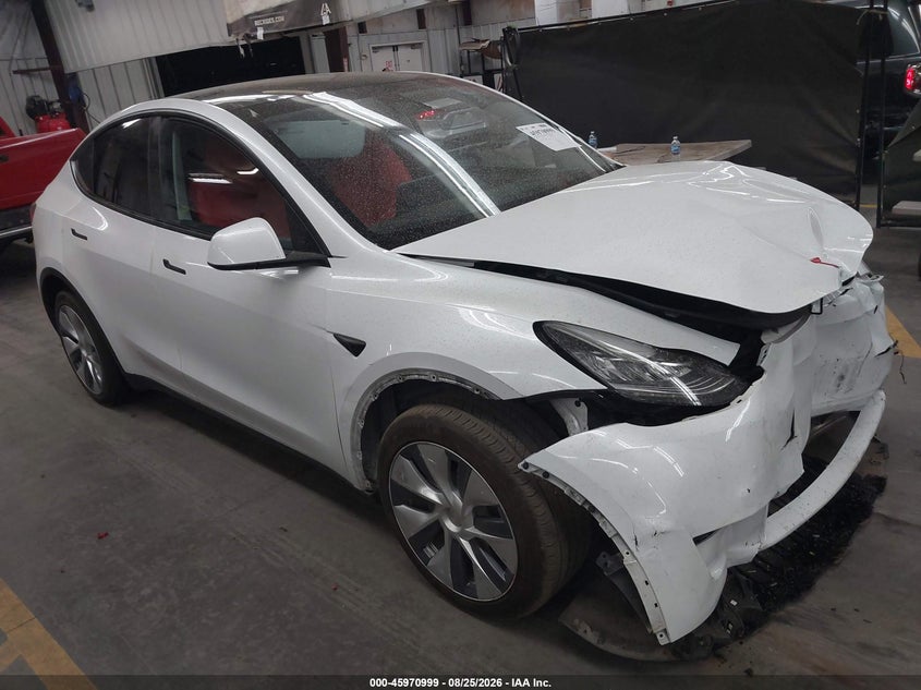 2023 Tesla Model y VIN 7SAYGDEE8PA098569 — IAAI salvage auction photo
