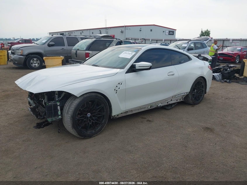 2021 BMW M4 VIN WBS53AZ02MCF90093 IAAI salvage auction — FRONT & REAR, Salvage Title, sold $20,600 on 2026-10-04 (photo 2)