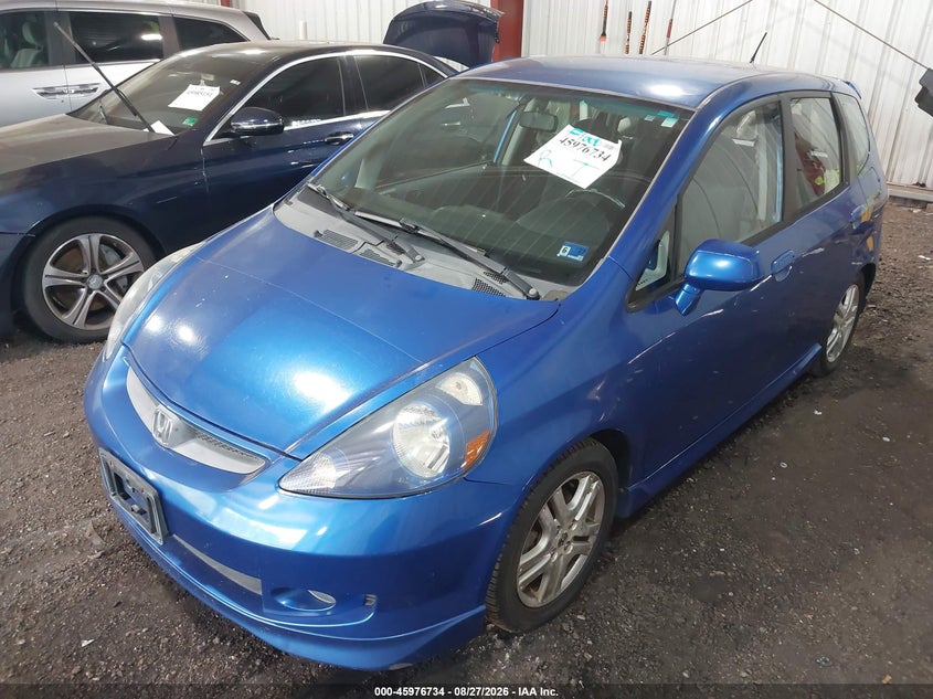 2007 Honda Fit VIN JHMGD38667S016844 IAAI salvage auction — WATER/FLOOD, Clear, sold $1,250 on 2026-10-03 (photo 2)