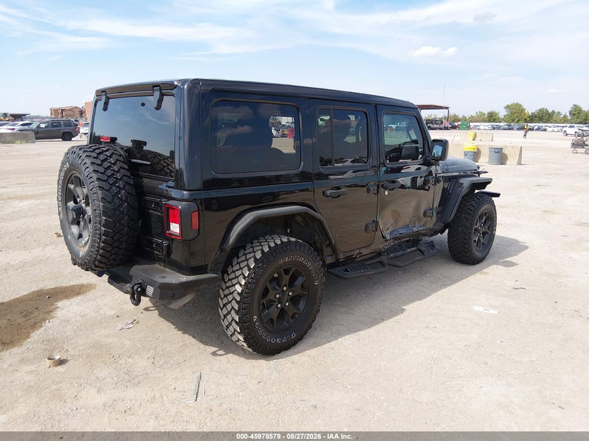 2023 Jeep Wrangler / VIN 1C4HJXDGXPW543511 IAAI salvage auction — SIDE, Wait Title, sold $15,500 on 2026-10-04 (photo 4)