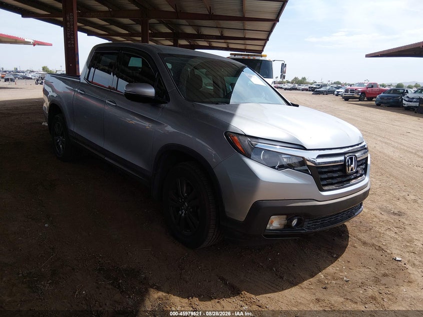 2019 Honda Ridgeline VIN 5FPYK3F18KB041275 — IAAI salvage auction photo