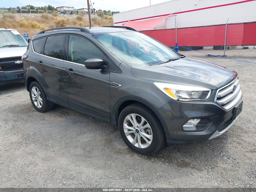 2018 Ford Escape VIN 1FMCU9GD3JUD08767 — IAAI salvage auction photo