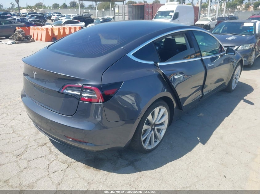 2018 Tesla Model 3 VIN 5YJ3E1EA5JF012086 IAAI salvage auction — LEFT SIDE, Wait Title, sold $6,275 on 2026-09-16 (photo 4)