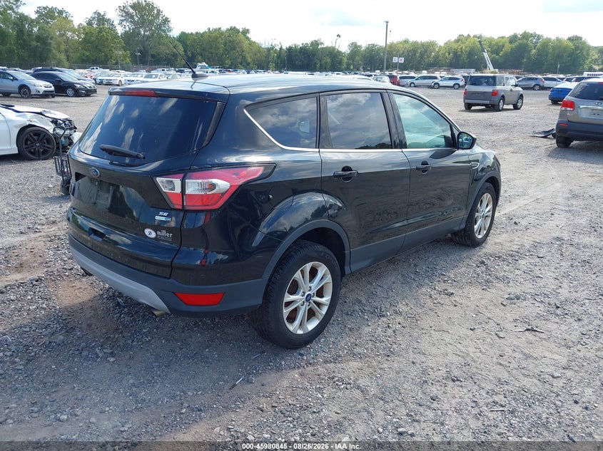 2017 Ford Escape VIN 1FMCU9GD6HUD63482 IAAI salvage auction — NORMAL WEAR, Clear (New Jersey), sold $275 on 2026-09-07 (photo 4)