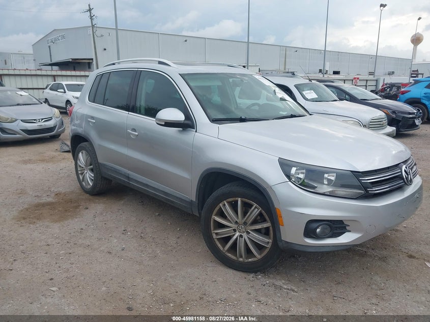 2014 Volkswagen Tiguan VIN WVGAV3AX4EW622202 IAAI salvage auction — WATER/FLOOD, Salvage Title, sold $600 on 2026-10-07 (photo 1)
