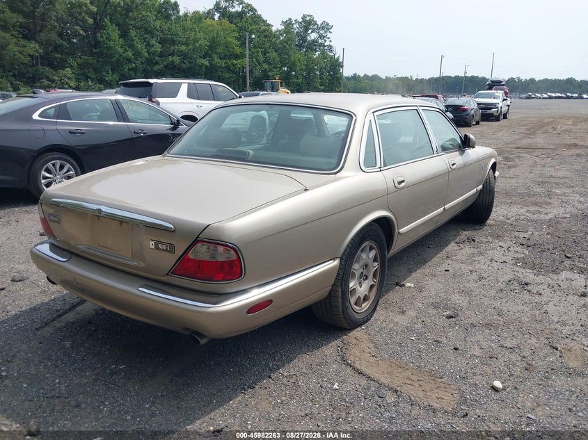 1998 Jaguar Xj VIN SAJHX6243WC833723 IAAI salvage auction — NORMAL WEAR, Clear, sold $1,300 on 2026-09-09 (photo 4)