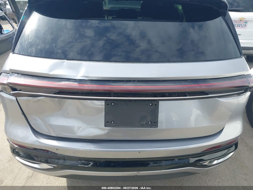 2025 Lincoln Nautilus VIN 5LMPJ9J49SJ963423 IAAI salvage auction — REAR END, Wait Title, sold $31,250 on 2026-09-16 (photo 6)