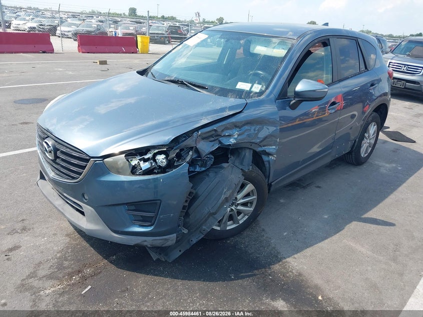 2016 Mazda Cx-5 VIN JM3KE4BY0G0662179 IAAI salvage auction — Unknown, Wait Title, sold $0 on 2026-10-07 (photo 2)