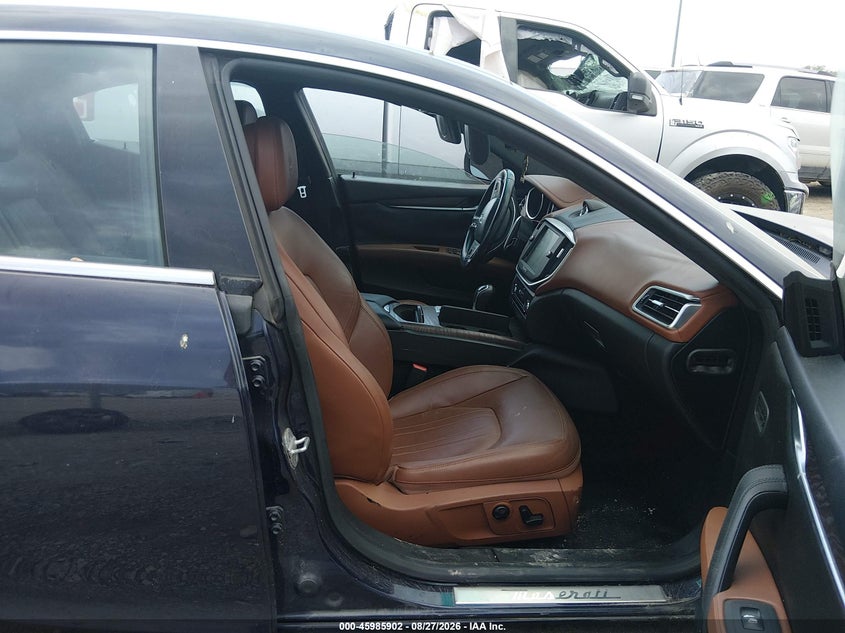 2014 Maserati Ghibli VIN ZAM57RTA0E1099622 IAAI salvage auction — NORMAL WEAR, Original (Texas), sold $775 on 2026-09-08 (photo 5)
