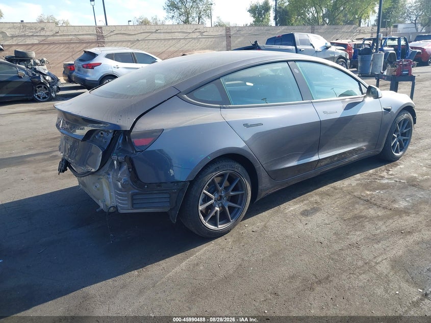 2023 Tesla Model 3 VIN 5YJ3E1EA1PF616436 IAAI salvage auction — FRONT & REAR, Salvage Title, sold $8,900 on 2026-10-04 (photo 4)