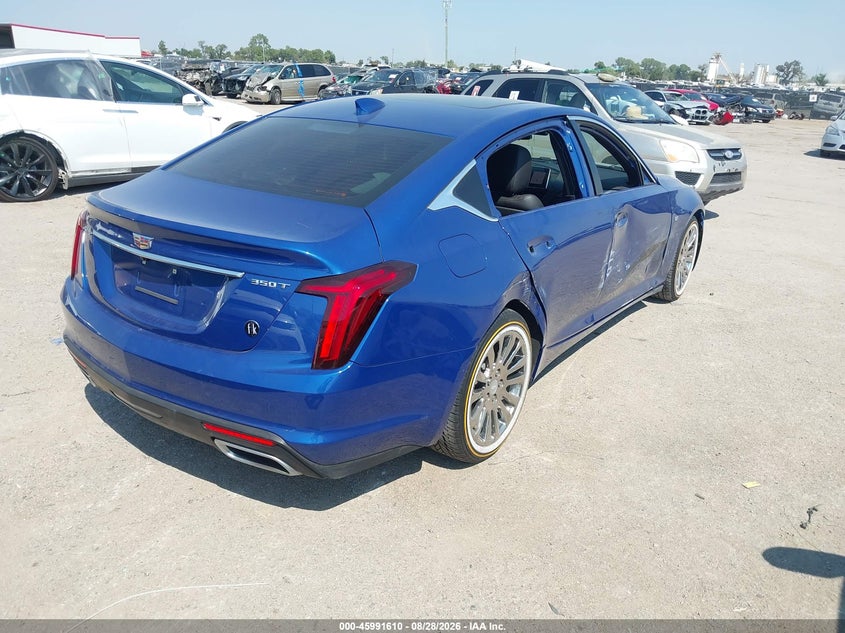 2021 Cadillac Ct5 VIN 1G6DW5RK7M0145658 IAAI salvage auction — SIDE, Wait Title, sold $10,800 on 2026-09-06 (photo 4)