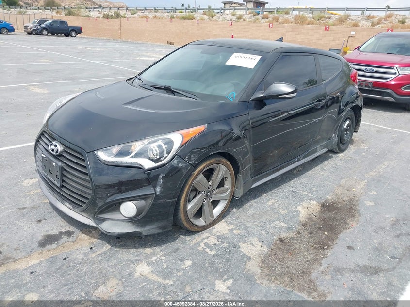 2014 Hyundai Veloster VIN KMHTC6AE1EU208191 IAAI salvage auction — FRONT & REAR, Wait Title, sold $875 on 2026-10-09 (photo 2)