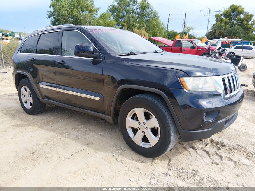 2011 Jeep Grand cherokee VIN 1J4RR4GG3BC656180 IAAI salvage auction — NORMAL WEAR, Clear (Alabama), sold $1,250 on 2026-09-15 (photo 1)