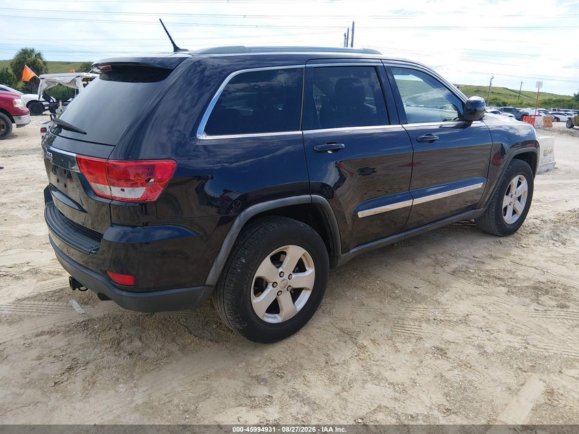 2011 Jeep Grand cherokee VIN 1J4RR4GG3BC656180 IAAI salvage auction — NORMAL WEAR, Clear (Alabama), sold $1,250 on 2026-09-15 (photo 4)