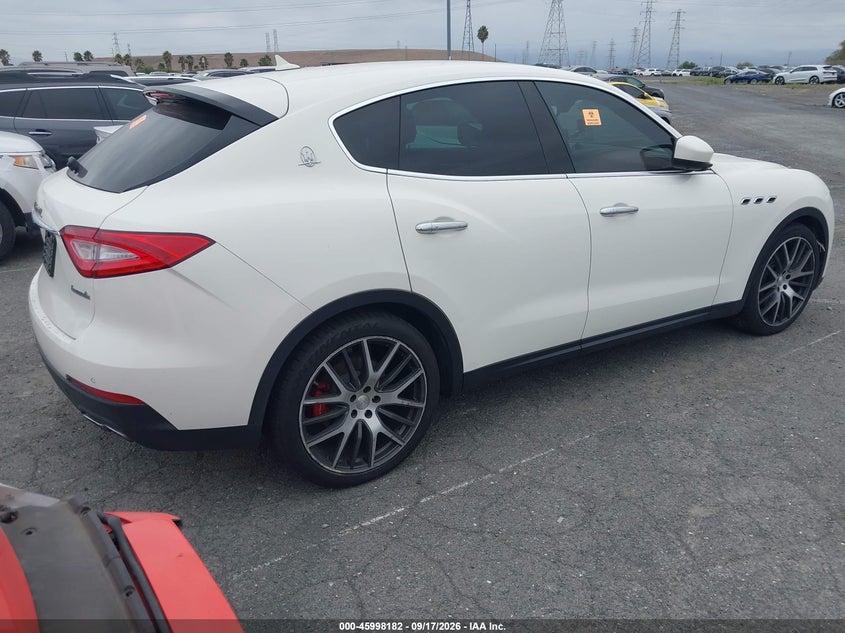 2017 Maserati Levante VIN ZN661XUAXHX243822 IAAI salvage auction — BIOHAZARD/CHEMICAL, Wait Title, sold $3,900 on 2026-10-09 (photo 4)