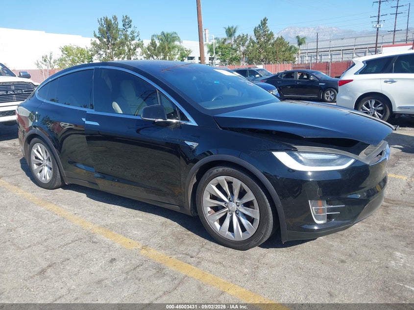 2016 Tesla Model x VIN 5YJXCBE24GF016421 IAAI salvage auction — REAR END, Salvage Title, sold $5,100 on 2026-10-10 (photo 1)