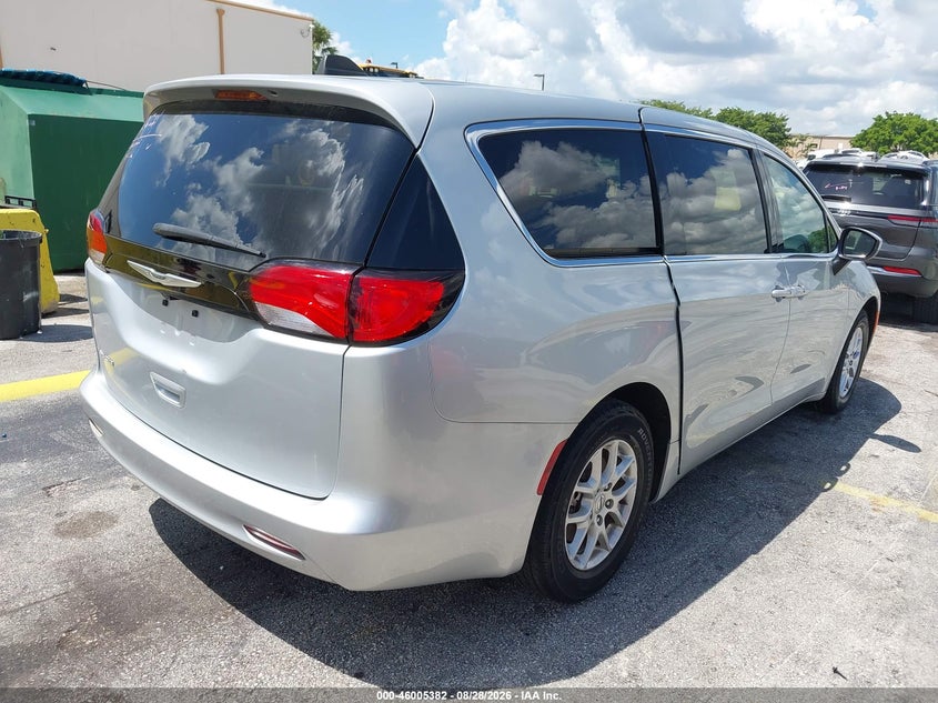2023 Chrysler Voyager VIN 2C4RC1CG0PR596093 IAAI salvage auction — LEFT SIDE, Salvage (Tennessee), sold $6,600 on 2026-09-10 (photo 4)