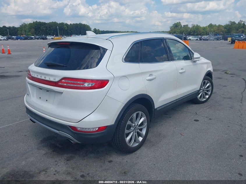 2019 Lincoln Mkc VIN 5LMCJ2C95KUL30155 IAAI salvage auction — SIDE, Wait Title, sold $5,700 on 2026-09-27 (photo 4)