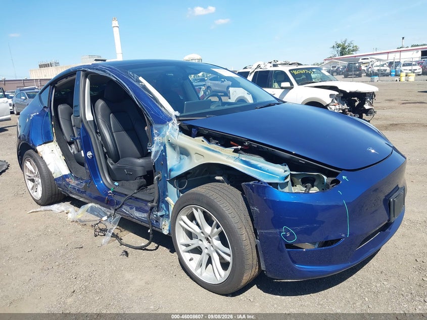 2023 Tesla Model y VIN 7SAYGDEE3PF850407 IAAI salvage auction — FRONT END, Wait Title, sold $11,200 on 2026-10-07 (photo 6)