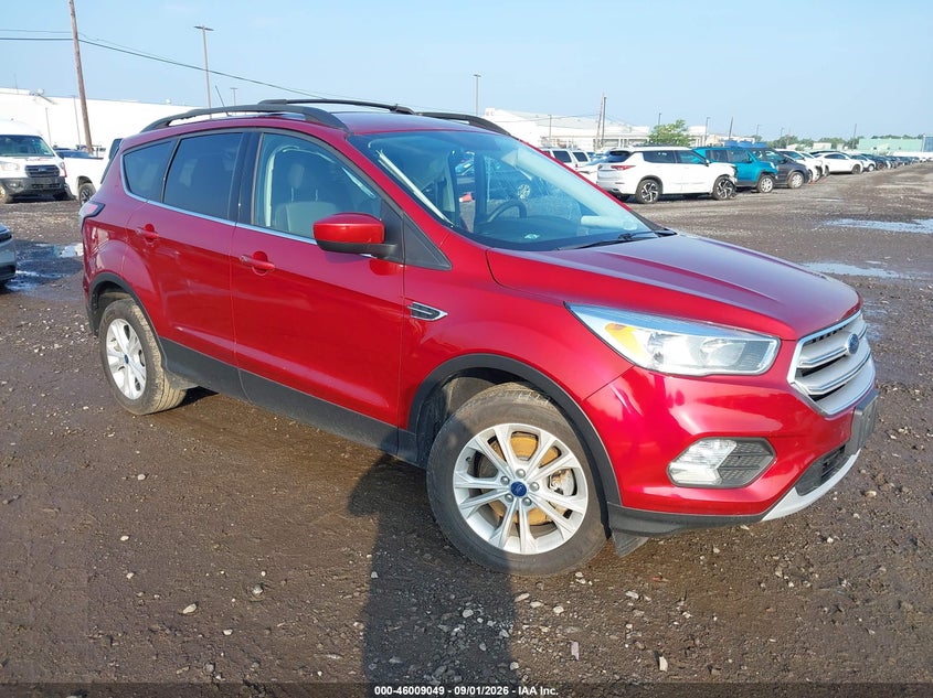 2018 Ford Escape VIN 1FMCU9GD8JUD46558 IAAI salvage auction — LEFT SIDE, Salvage Title, sold $1,975 on 2026-09-16 (photo 1)