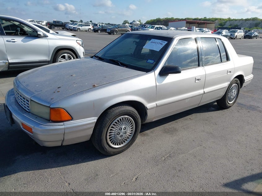 1994 Plymouth Acclaim VIN 1P3AA4636RF207643 IAAI salvage auction — NORMAL WEAR, Clear (Texas), sold $300 on 2026-09-10 (photo 2)