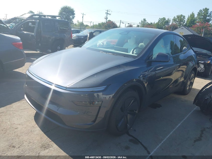 2026 Tesla Model Y VIN 7SAYGDEE1TA638192 IAAI salvage auction — Rear, Salvage, sold $31,500 on 2026-10-19 (photo 2)