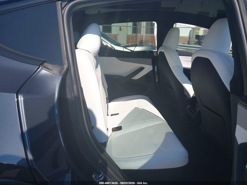 2026 Tesla Model Y VIN 7SAYGDEE1TA638192 IAAI salvage auction — Rear, Salvage, sold $31,500 on 2026-10-19 (photo 8)
