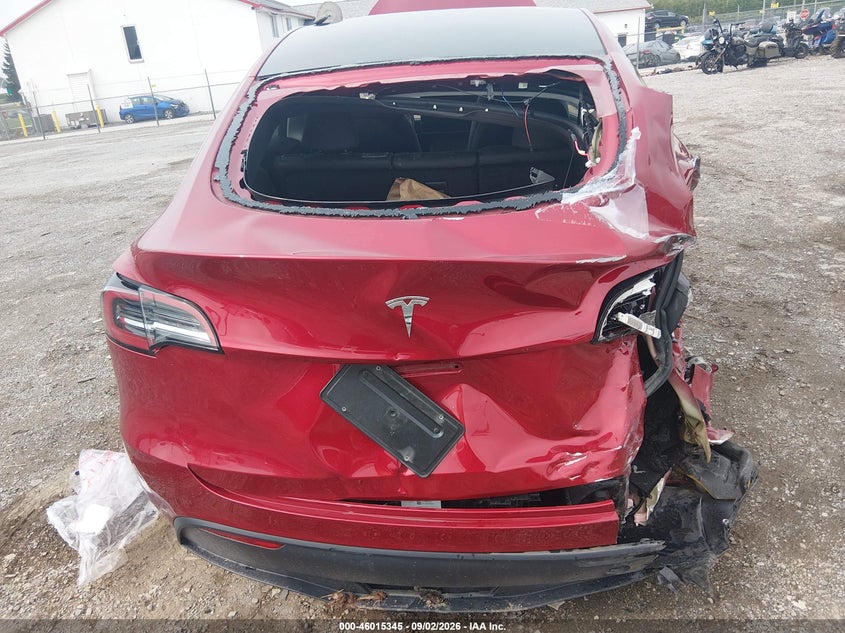 2025 Tesla Model y VIN 7SAYGDED7SA372957 IAAI salvage auction — REAR END, Wait Title, sold $3,150 on 2026-10-11 (photo 6)