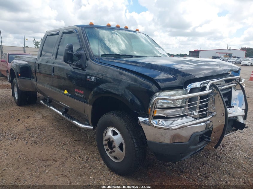 2002 Ford F350 VIN 1FTWW33F22EA28138 — IAAI salvage auction photo