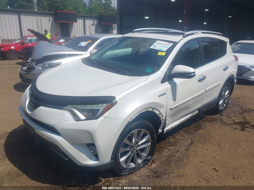2016 Toyota Rav 4 VIN JTMDJREV2GD052286 IAAI salvage auction — LEFT SIDE, Wait Title, sold $7,750 on 2026-09-24 (photo 2)