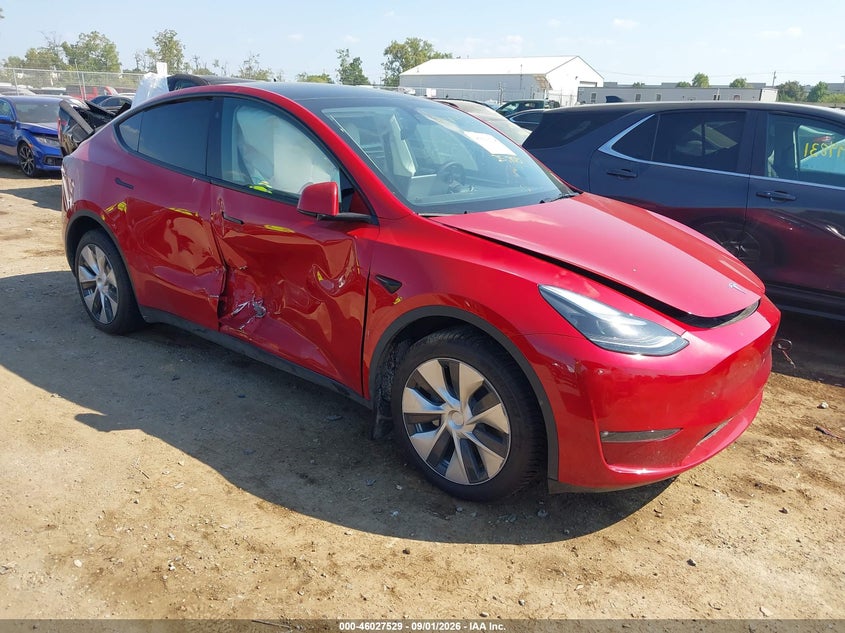 2023 Tesla Model y VIN 7SAYGDEE6PF692547 — IAAI salvage auction photo
