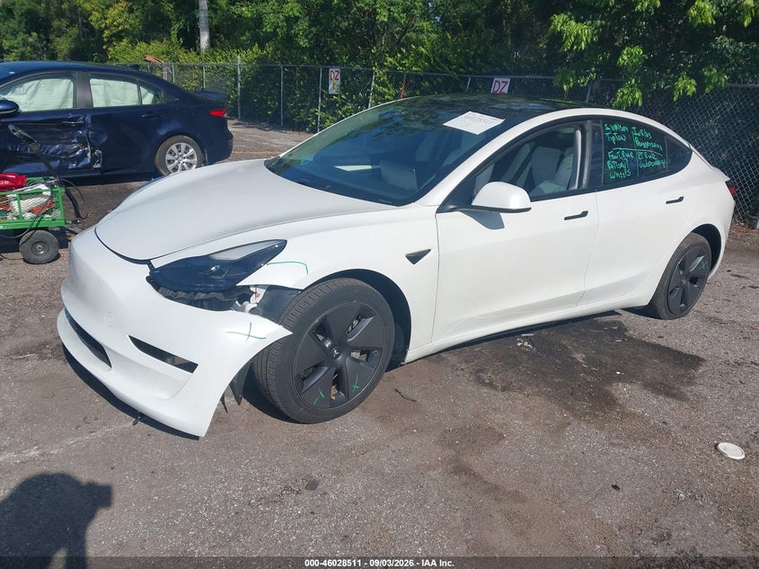 2023 Tesla Model 3 VIN 5YJ3E1EAXPF573800 IAAI salvage auction — FRONT END, Salvage Title, sold $8,700 on 2026-10-02 (photo 2)