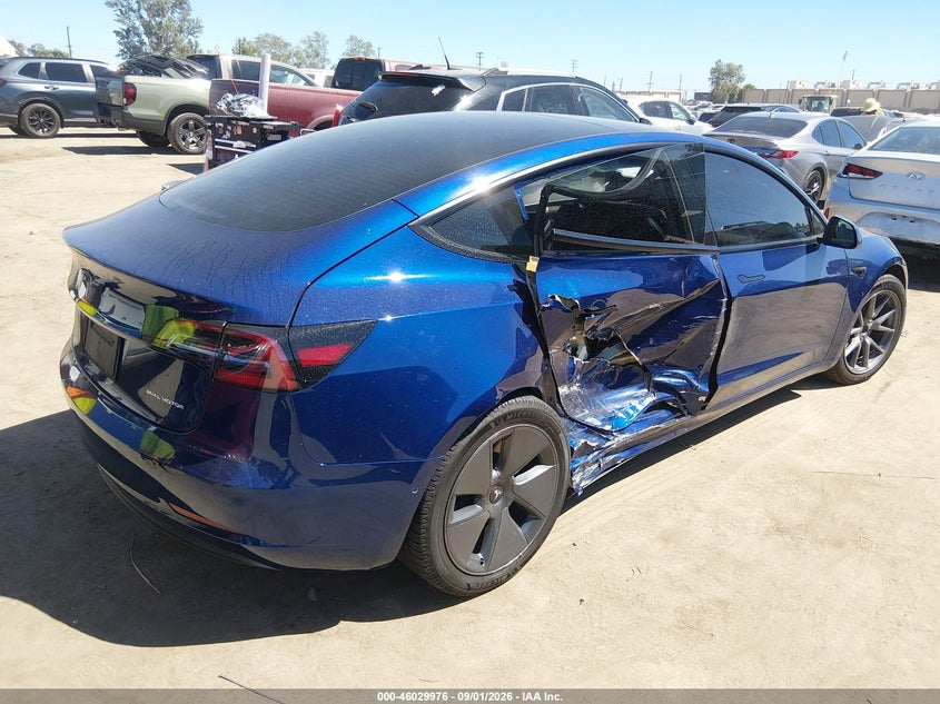 2021 Tesla Model 3 VIN 5YJ3E1EB5MF079459 IAAI salvage auction — NORMAL WEAR, Clear - Dealer Only (California), sold $5,550 on 2026-09-10 (photo 4)