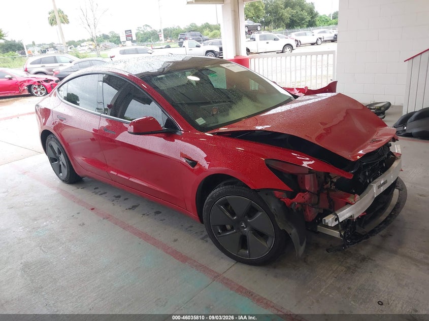 2023 Tesla Model 3 VIN 5YJ3E1EA5PF587409 — IAAI salvage auction photo