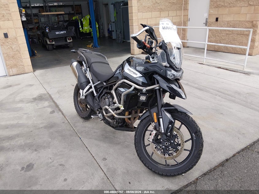 2023 Triumph Tiger VIN SMTE65DF7PTBF6027 IAAI salvage auction — SIDE, Wait Title, sold $3,800 on 2026-10-09 (photo 1)