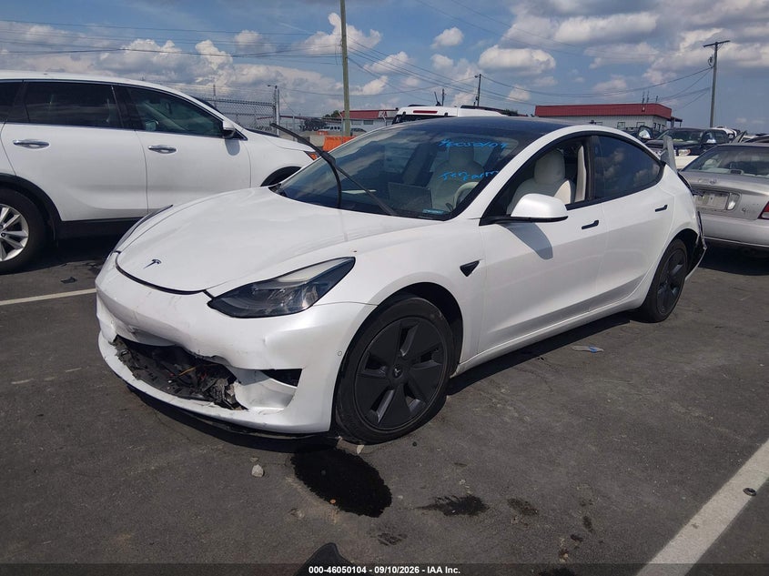 2021 Tesla Model 3 VIN 5YJ3E1EB9MF013299 IAAI salvage auction — REAR END, Salvage Title, sold $4,975 on 2026-10-22 (photo 2)