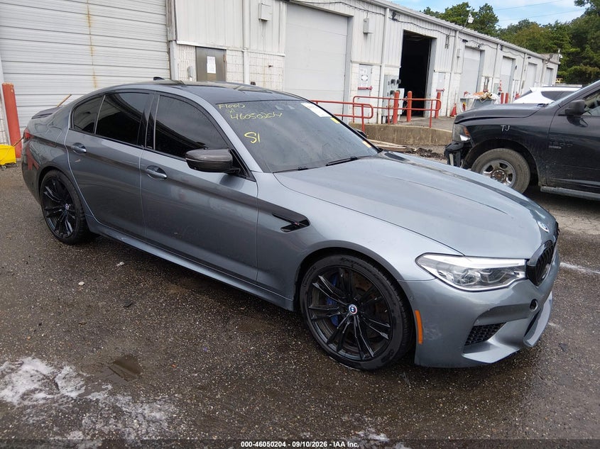 2019 BMW M5 VIN WBSJF0C54KB285599 IAAI salvage auction — WATER/FLOOD, Wait Title, sold $23,600 on 2026-10-06 (photo 1)
