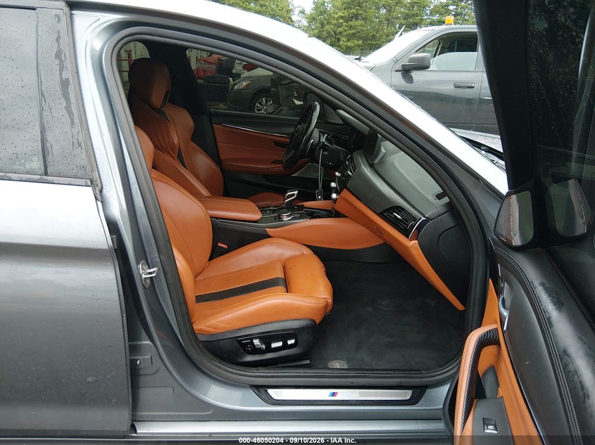 2019 BMW M5 VIN WBSJF0C54KB285599 IAAI salvage auction — WATER/FLOOD, Wait Title, sold $23,600 on 2026-10-06 (photo 5)